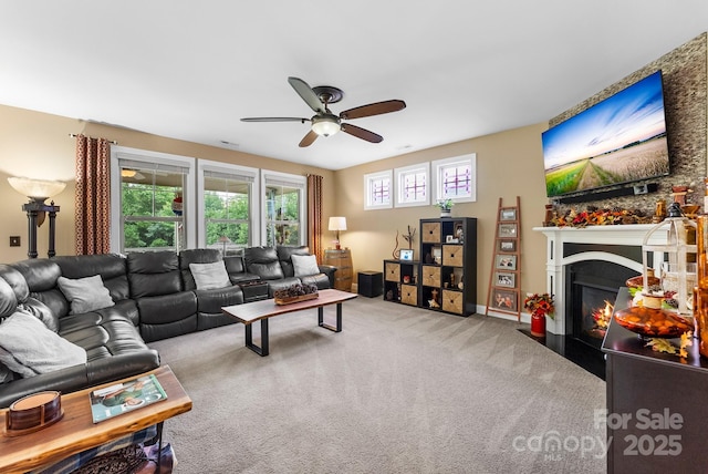 708 Ardent Trl, Belmont, NC 28012 - living area featuring ceiling fan, a fireplace with flush hearth, and carpet floors
