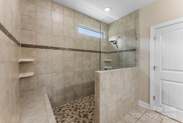 708 Ardent Trl, Belmont, NC 28012 - bathroom featuring walk in shower and tile patterned floors