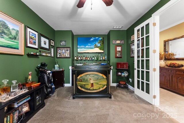 708 Ardent Trl, Belmont, NC 28012 - detailed view of a bar, carpet flooring, ceiling fan, and baseboards