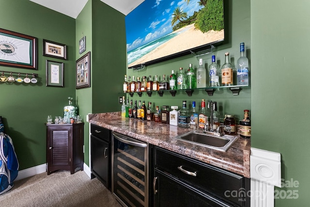 708 Ardent Trl, Belmont, NC 28012 - indoor wet bar featuring beverage cooler, light colored carpet, and baseboards