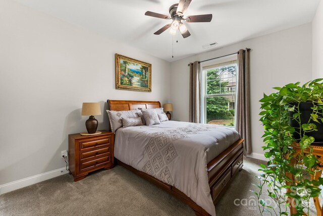708 Ardent Trl, Belmont, NC 28012 - bedroom with baseboards, light colored carpet, and ceiling fan