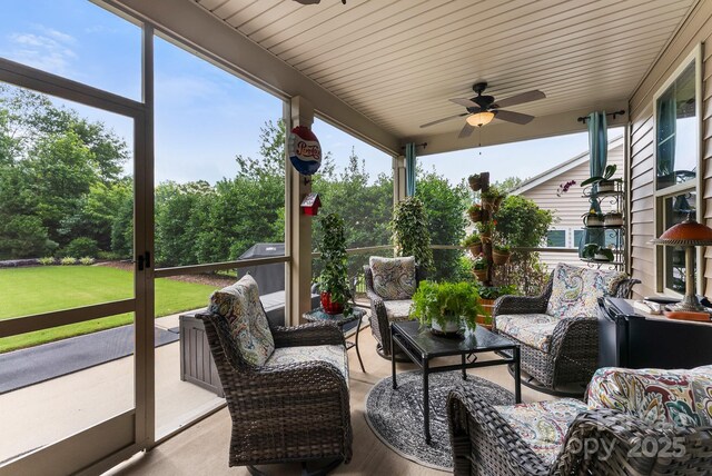 708 Ardent Trl, Belmont, NC 28012 - sunroom featuring a ceiling fan and outdoor lounge area