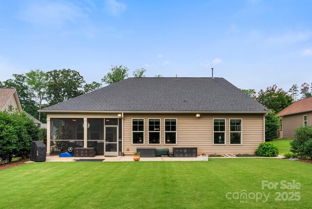 708 Ardent Trl, Belmont, NC 28012 - back of house with a patio area, a sunroom, a lawn, and roof with shingles
