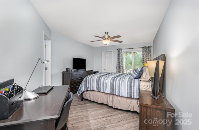 18741 Nautical Dr Unit 205, Cornelius, NC 28031 - bedroom featuring wood finished floors and a ceiling fan