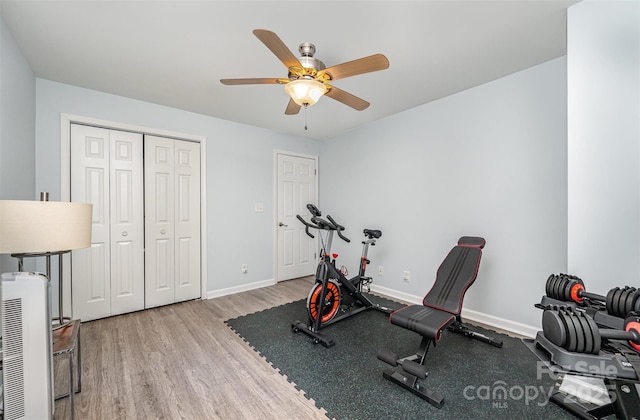 18741 Nautical Dr Unit 205, Cornelius, NC 28031 - exercise area featuring a ceiling fan, wood finished floors, and baseboards