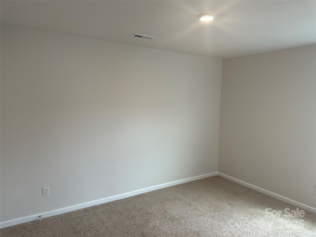 9730 Tea Garden Dr, Gastonia, NC 28056 - empty room with baseboards and light colored carpet