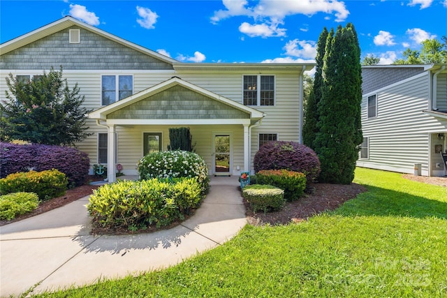 49009 Dockside Ln Unit D, Albemarle, NC 28001 - view of front facade with a front yard and covered porch