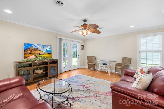 49009 Dockside Ln Unit D, Albemarle, NC 28001 - living room with crown molding, wood finished floors, a ceiling fan, and recessed lighting