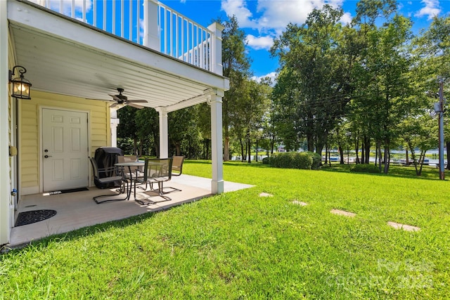 49009 Dockside Ln Unit D, Albemarle, NC 28001 - view of green lawn featuring ceiling fan, a patio area, and a balcony