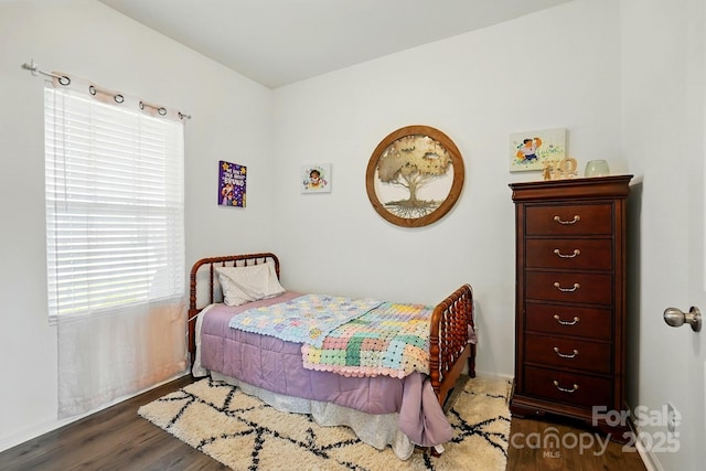 133 Aspire Cir, Wingate, NC 28174 - bedroom featuring dark wood finished floors and baseboards