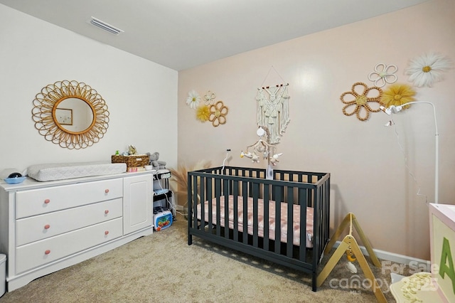 133 Aspire Cir, Wingate, NC 28174 - bedroom featuring carpet floors, a crib, and baseboards