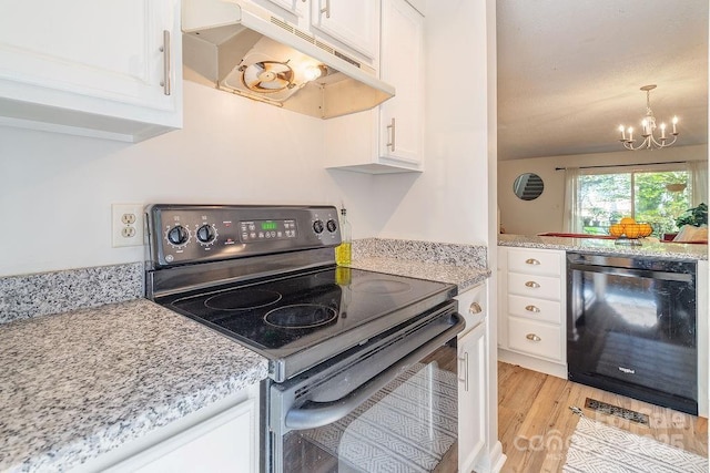 118 Colony Dr, Arden, NC 28704 - kitchen featuring black appliances, under cabinet range hood, white cabinets, a chandelier, and light wood-style floors