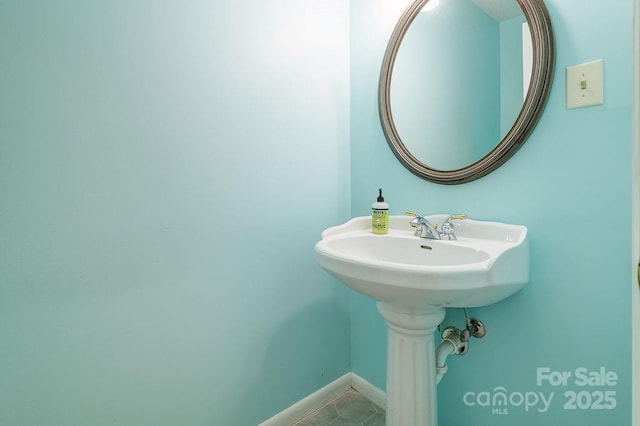 118 Colony Dr, Arden, NC 28704 - bathroom with tile patterned flooring and baseboards