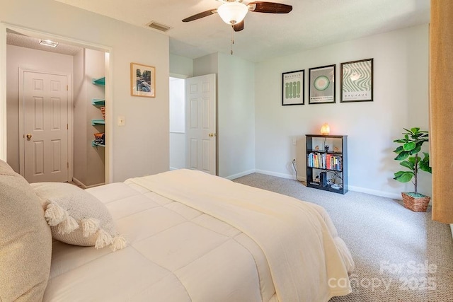 118 Colony Dr, Arden, NC 28704 - carpeted bedroom with baseboards and a ceiling fan