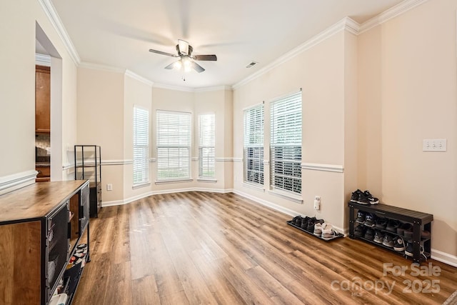 13820 Cypress Woods Dr, Huntersville, NC 28078 - living area with ceiling fan, wood finished floors, ornamental molding, and baseboards