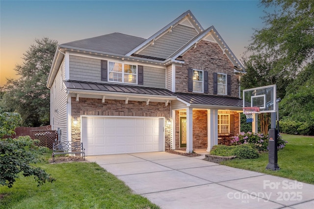516 Fair Oaks Dr, Fort Mill, SC 29708 - view of front of house featuring a standing seam roof, stone siding, and an attached garage