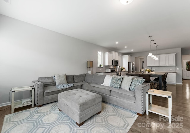 204 Fesperman Cir, Troutman, NC 28166 - living room featuring dark wood-style flooring and recessed lighting