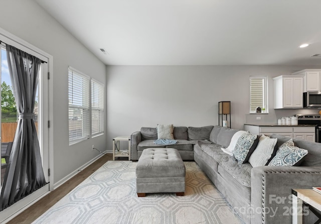 204 Fesperman Cir, Troutman, NC 28166 - living room with recessed lighting and dark wood-style floors