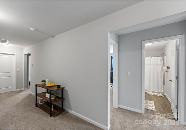 204 Fesperman Cir, Troutman, NC 28166 - hallway featuring light carpet
