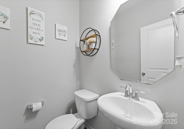 204 Fesperman Cir, Troutman, NC 28166 - half bath with a sink and toilet