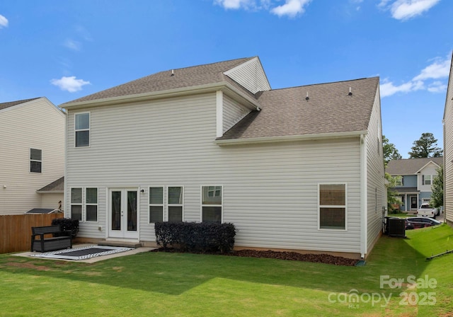 204 Fesperman Cir, Troutman, NC 28166 - rear view of property featuring a patio area, french doors, and a shingled roof