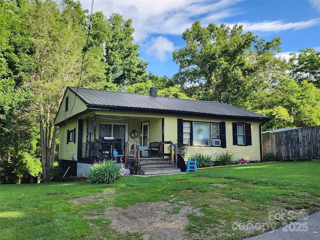165 Ray St, Waynesville, NC 28786 - view of front of property featuring covered porch, a metal roof, and a chimney
