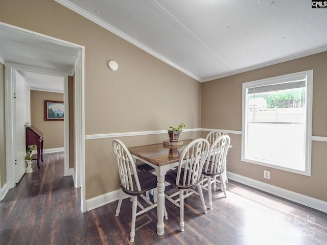 1989 White Oak Rd, Camden, SC 29020 - dining area featuring wood finished floors, baseboards, and ornamental molding
