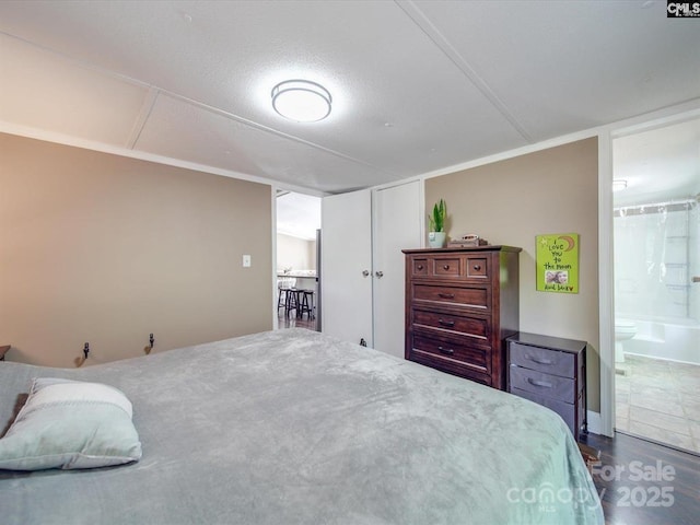 1989 White Oak Rd, Camden, SC 29020 - bedroom featuring ensuite bath and wood finished floors