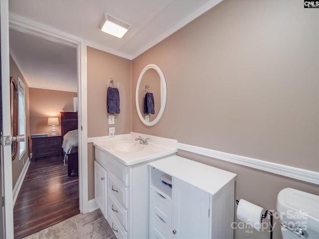 1989 White Oak Rd, Camden, SC 29020 - bathroom with vanity, toilet, and connected bathroom
