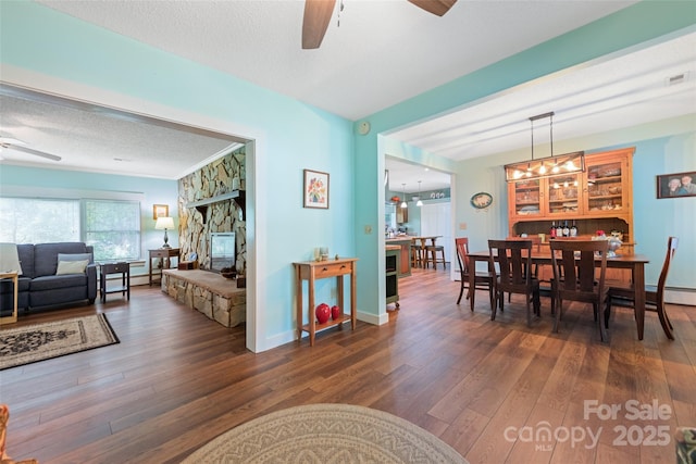 58 Campbell Creek Rd, Maggie Valley, NC 28751 - dining space featuring ceiling fan, wood finished floors, and a textured ceiling