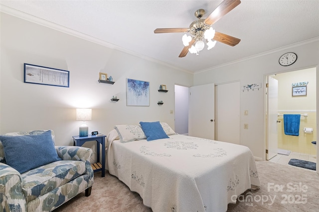 58 Campbell Creek Rd, Maggie Valley, NC 28751 - bedroom featuring light colored carpet, ornamental molding, ensuite bath, and a ceiling fan