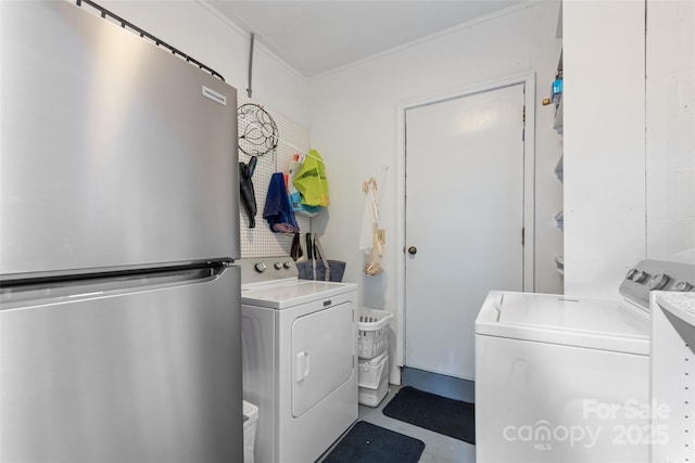 58 Campbell Creek Rd, Maggie Valley, NC 28751 - laundry room with separate washer and dryer and crown molding