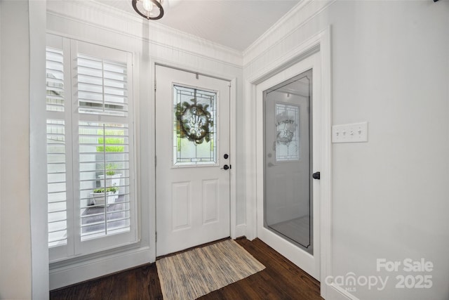 2004 Marquesas Ave, Tega Cay, SC 29708 - foyer entrance with ornamental molding and dark wood-type flooring