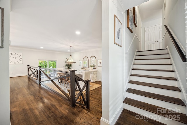 2004 Marquesas Ave, Tega Cay, SC 29708 - stairs featuring wood finished floors, recessed lighting, and crown molding