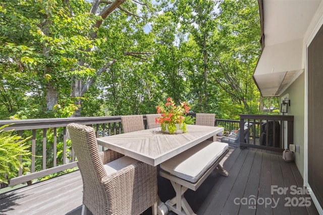2004 Marquesas Ave, Tega Cay, SC 29708 - deck featuring outdoor dining space and view of scattered trees
