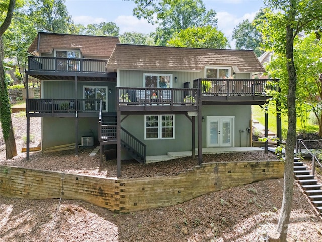 2004 Marquesas Ave, Tega Cay, SC 29708 - rear view of property with stairway, a deck, french doors, and a shingled roof
