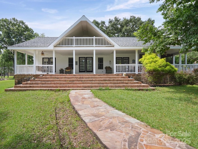 2442 Singleton Pt Unit 67, Liberty Hill, SC 29074 - country-style home with covered porch, a front yard, a ceiling fan, and roof with shingles