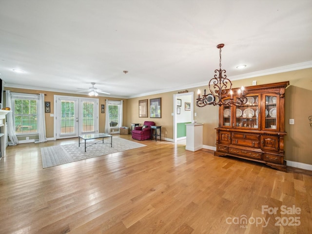 2442 Singleton Pt Unit 67, Liberty Hill, SC 29074 - living area featuring a chandelier, ornamental molding, light wood-style floors, and ceiling fan