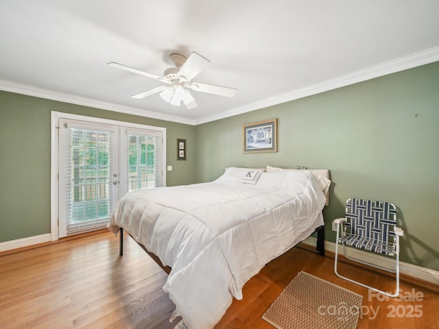 2442 Singleton Pt Unit 67, Liberty Hill, SC 29074 - bedroom featuring access to outside, ornamental molding, french doors, wood finished floors, and ceiling fan