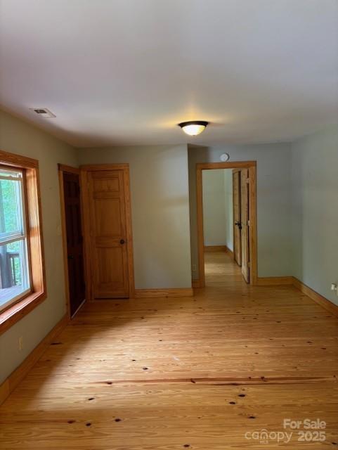 2070 Cashiers Valley Rd, Brevard, NC 28712 - empty room with baseboards and light wood finished floors