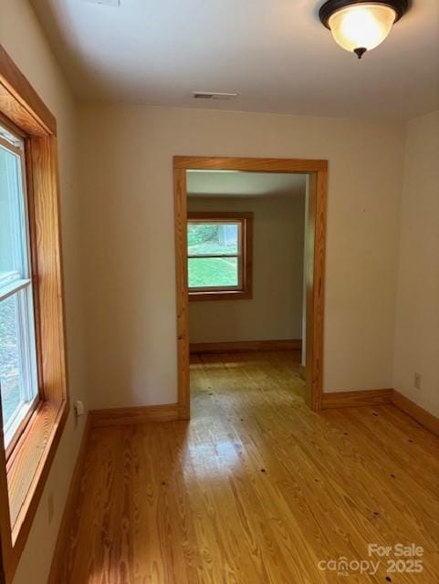 2070 Cashiers Valley Rd, Brevard, NC 28712 - empty room with light wood-type flooring and baseboards