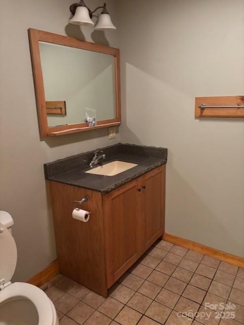 2070 Cashiers Valley Rd, Brevard, NC 28712 - half bathroom with vanity and tile patterned flooring