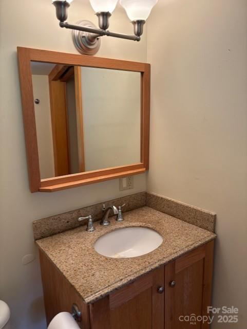2070 Cashiers Valley Rd, Brevard, NC 28712 - half bath featuring vanity and a chandelier