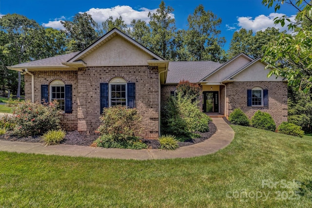 2790 Twin Oaks Dr, Morganton, NC 28655 - ranch-style home featuring a front lawn, brick siding, a shingled roof, and stucco siding