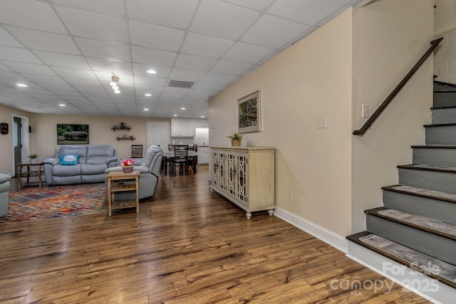 2790 Twin Oaks Dr, Morganton, NC 28655 - living room with wood finished floors, stairway, recessed lighting, and a drop ceiling