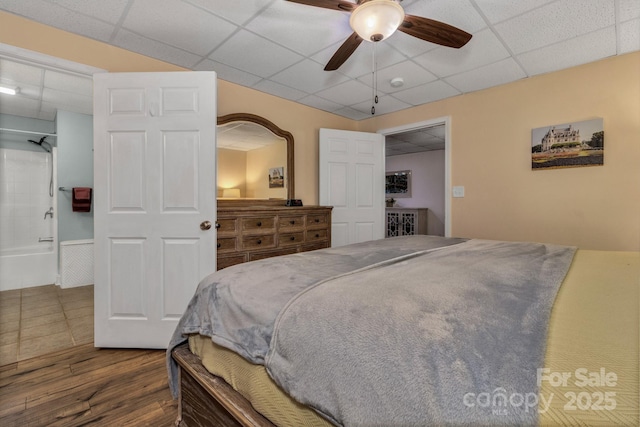 2790 Twin Oaks Dr, Morganton, NC 28655 - bedroom featuring a paneled ceiling, wood finished floors, and ceiling fan