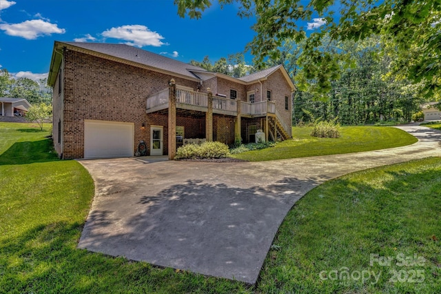 2790 Twin Oaks Dr, Morganton, NC 28655 - view of front of property with brick siding, a front yard, driveway, and an attached garage