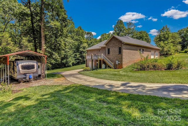 2790 Twin Oaks Dr, Morganton, NC 28655 - view of side of property featuring stairs, a carport, brick siding, a yard, and a deck