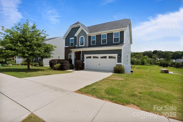 207 Welcombe St, Mooresville, NC 28115 - view of front of property featuring concrete driveway, an attached garage, and a front yard