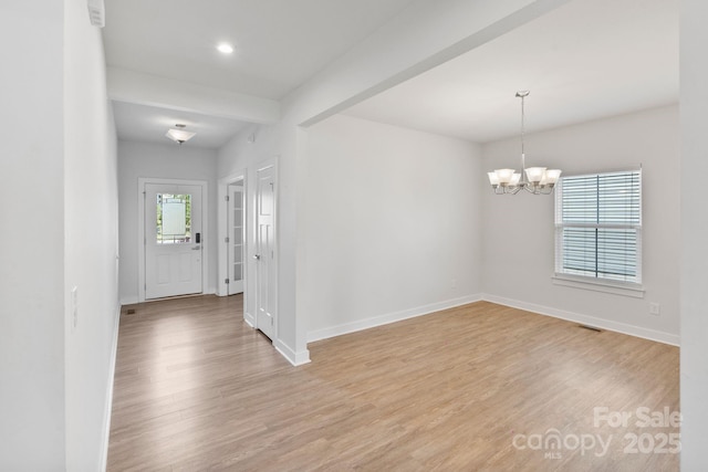 207 Welcombe St, Mooresville, NC 28115 - unfurnished room with light wood-style floors, baseboards, a chandelier, and recessed lighting